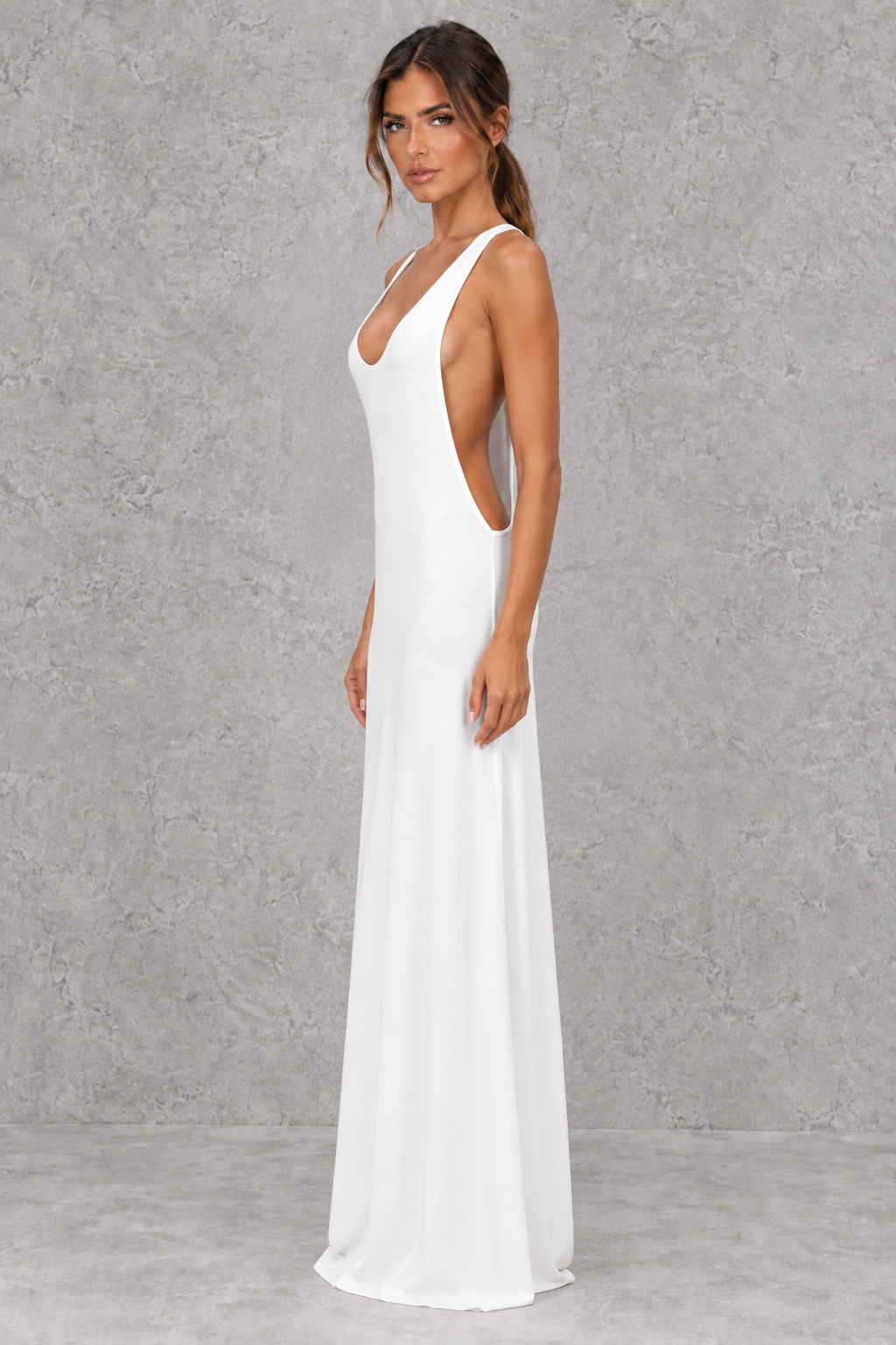 Side view of a sleek bodycon maxi dress showing its figure-skimming silhouette.