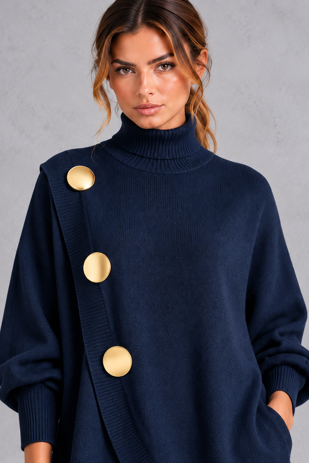 Close-up of the gold-tone buttons on the wrap-effect front