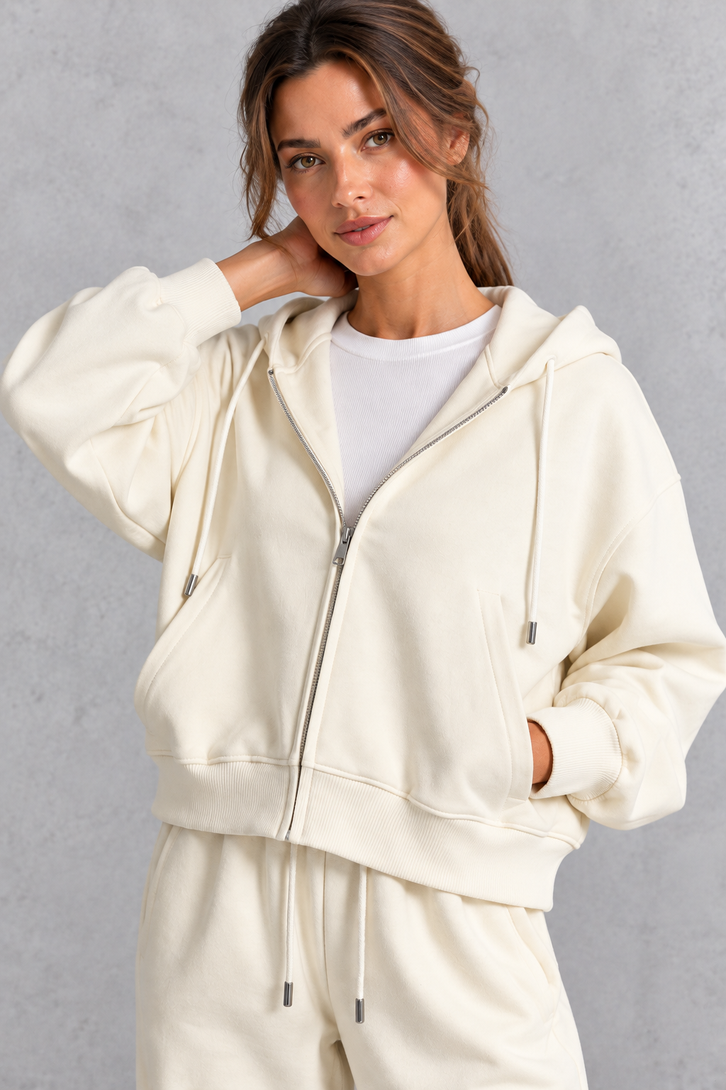 Close-up of the drawstring hood and full front zip