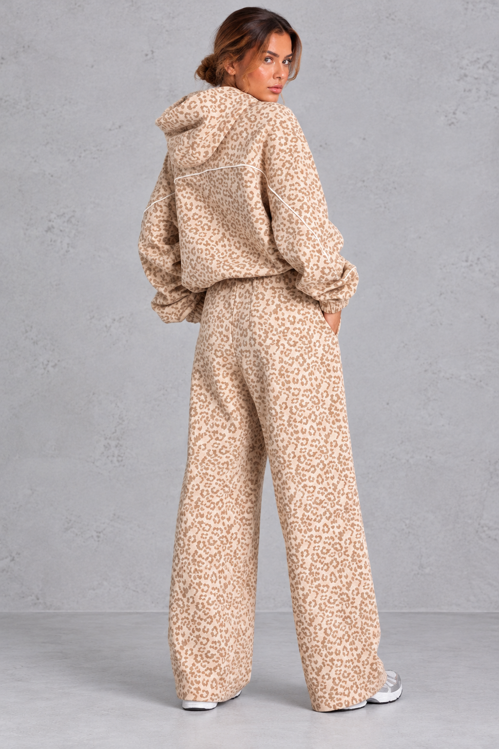 Leopard tracksuit styled with sneakers for a relaxed weekend