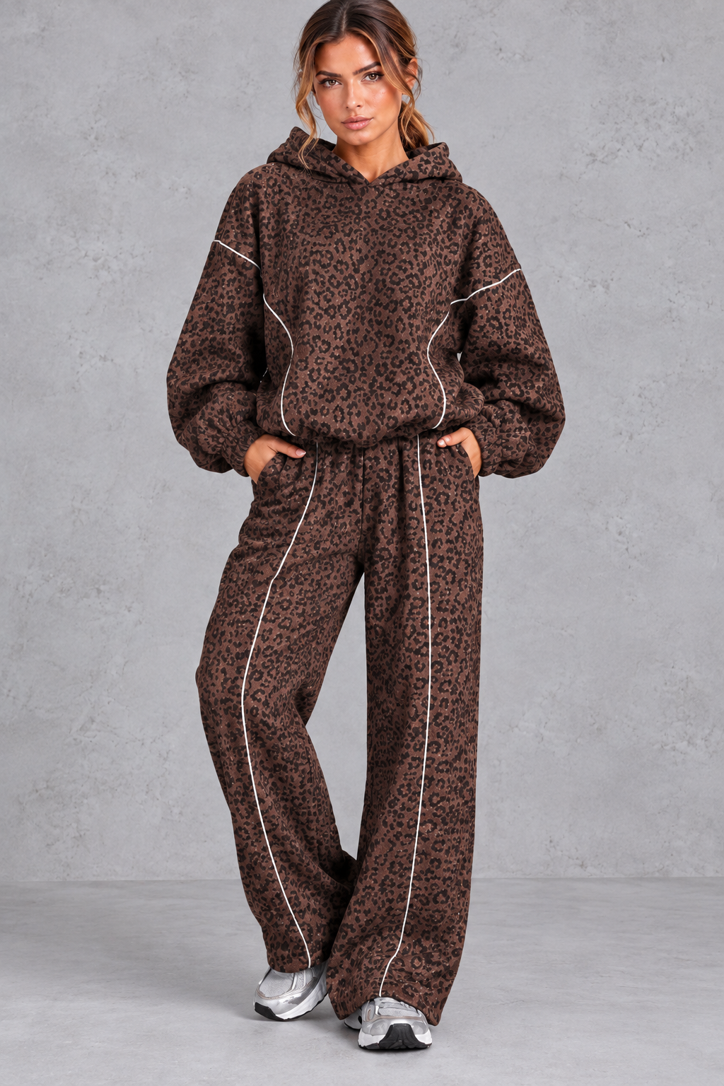 Wide leg leopard joggers with front seam piping, side view