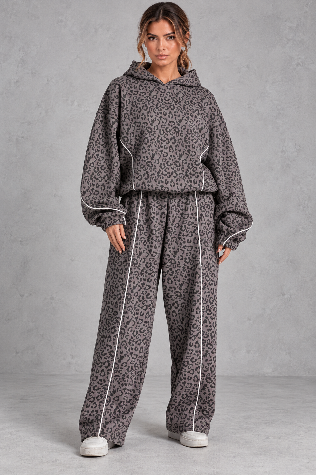 Oversized hoodie with attached hood, styled detail