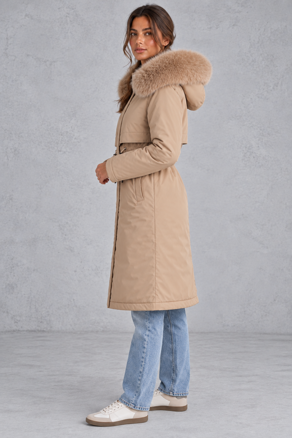 Women's winter parka with faux fur-trimmed hood and front zipper closure