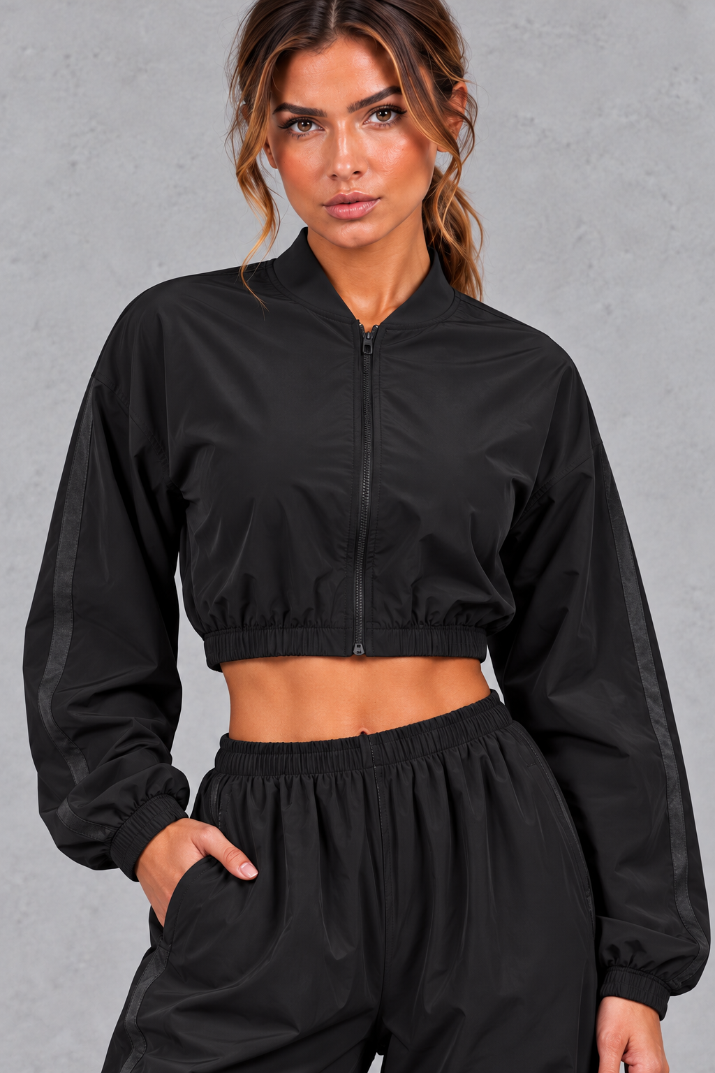 Close-up of the baseball-style stand collar and front zip