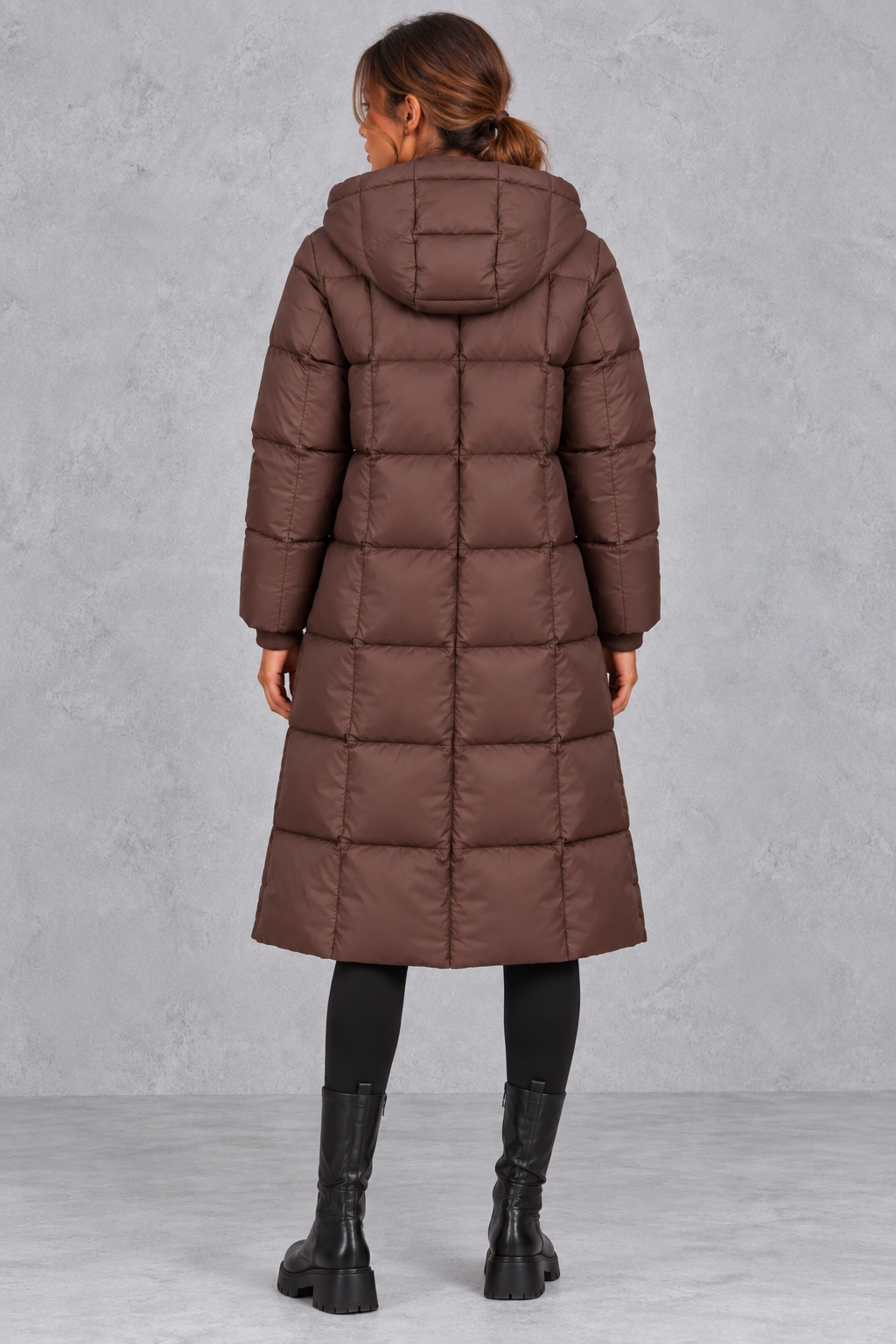 High neckline and padded hood detail on the puffer coat