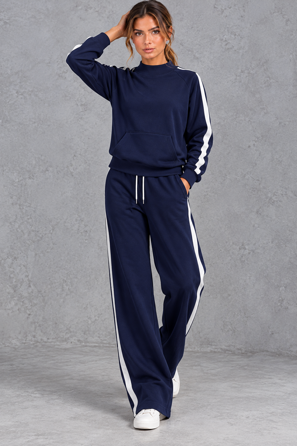 Mock neck sweatshirt and pants worn as a matching set, side view