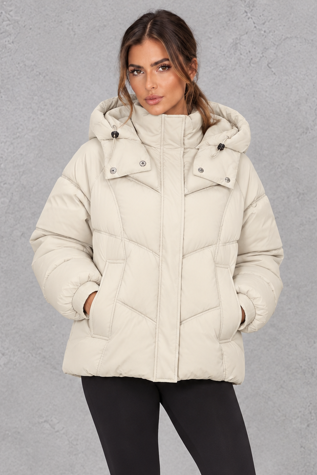 Women's geometric quilted puffer jacket with hood, front view