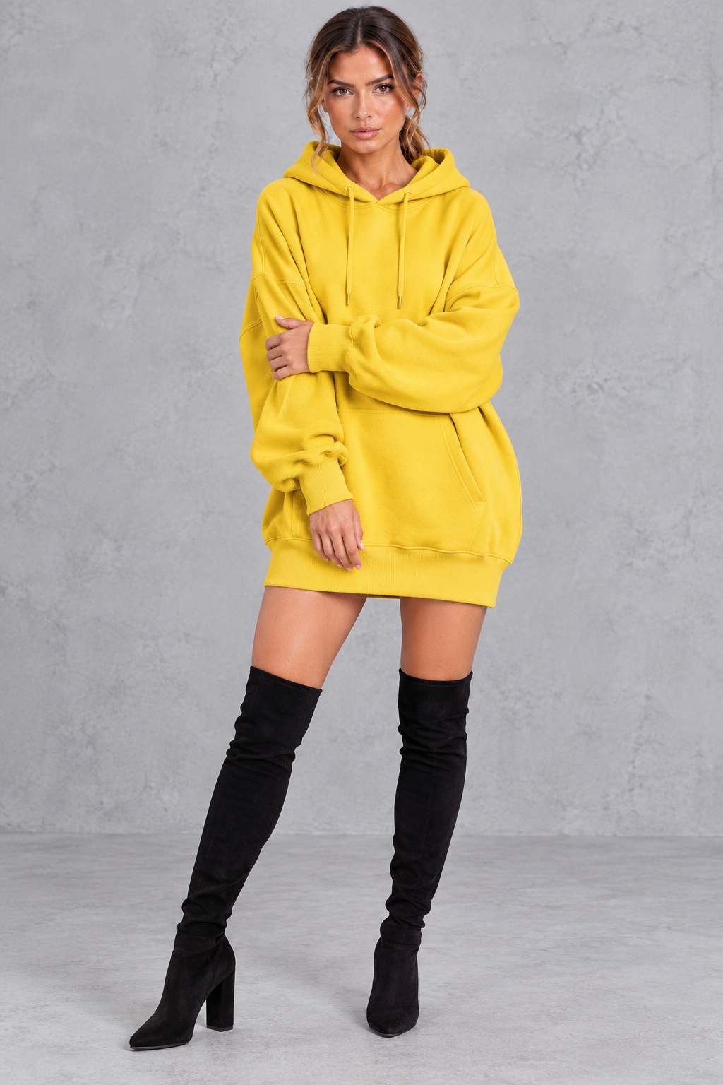 Side view of a women's oversized hoodie dress showing the slouchy silhouette