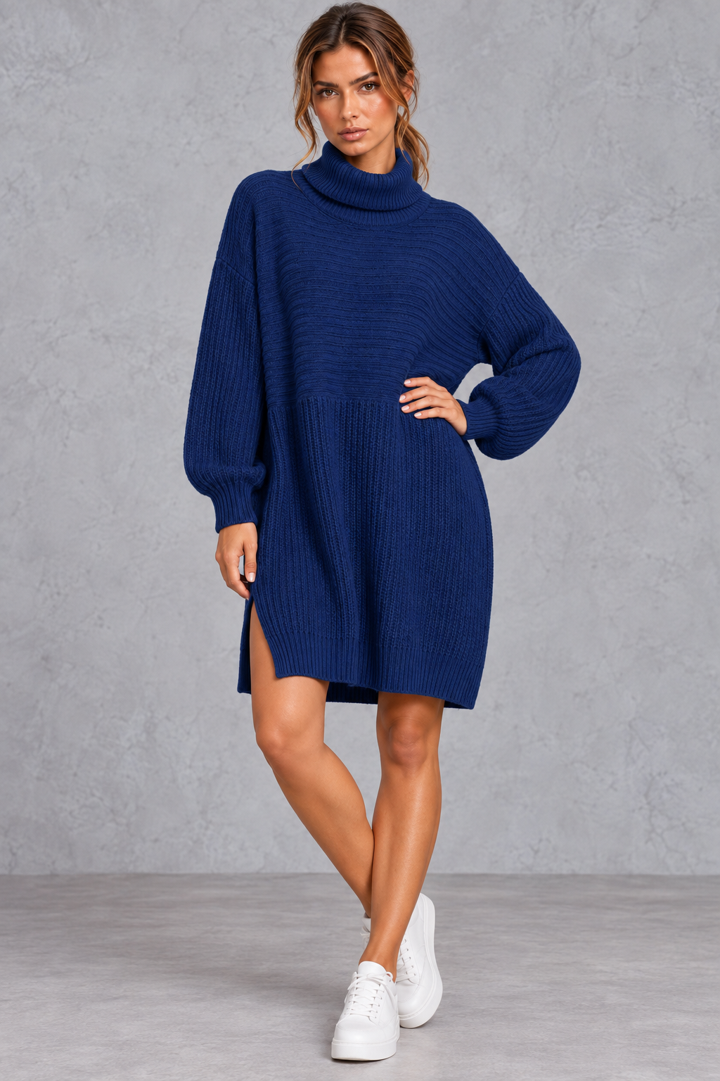 Side slit hem detail on a women's plus size sweater mini dress