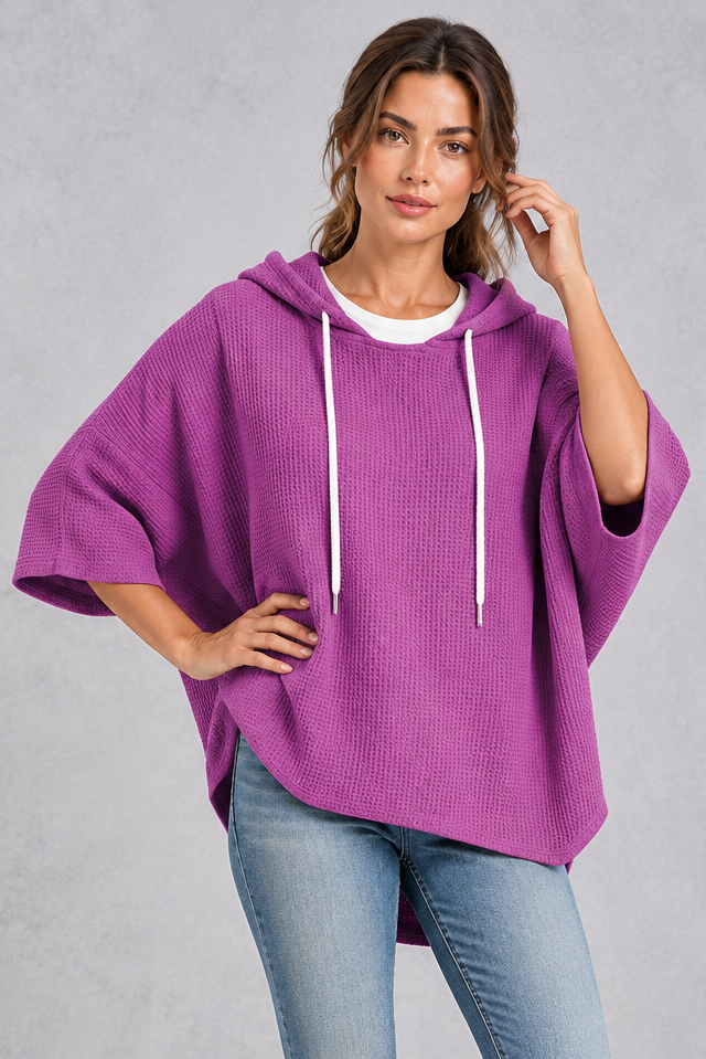 Back view showing curved high-low hem
