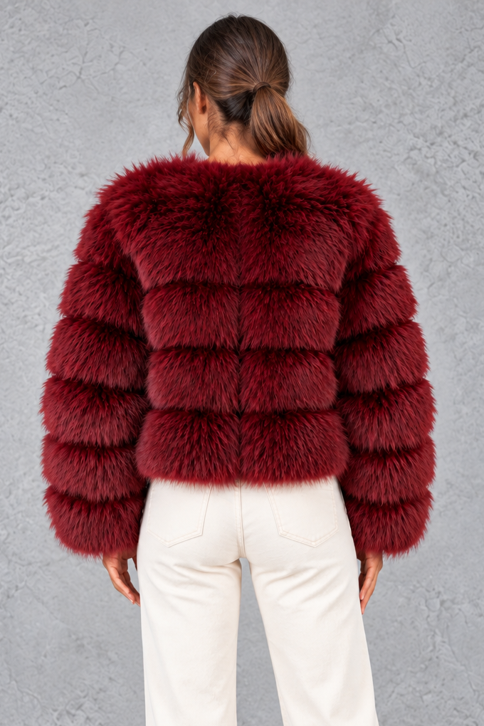 Cropped faux fur jacket styled for a holiday party