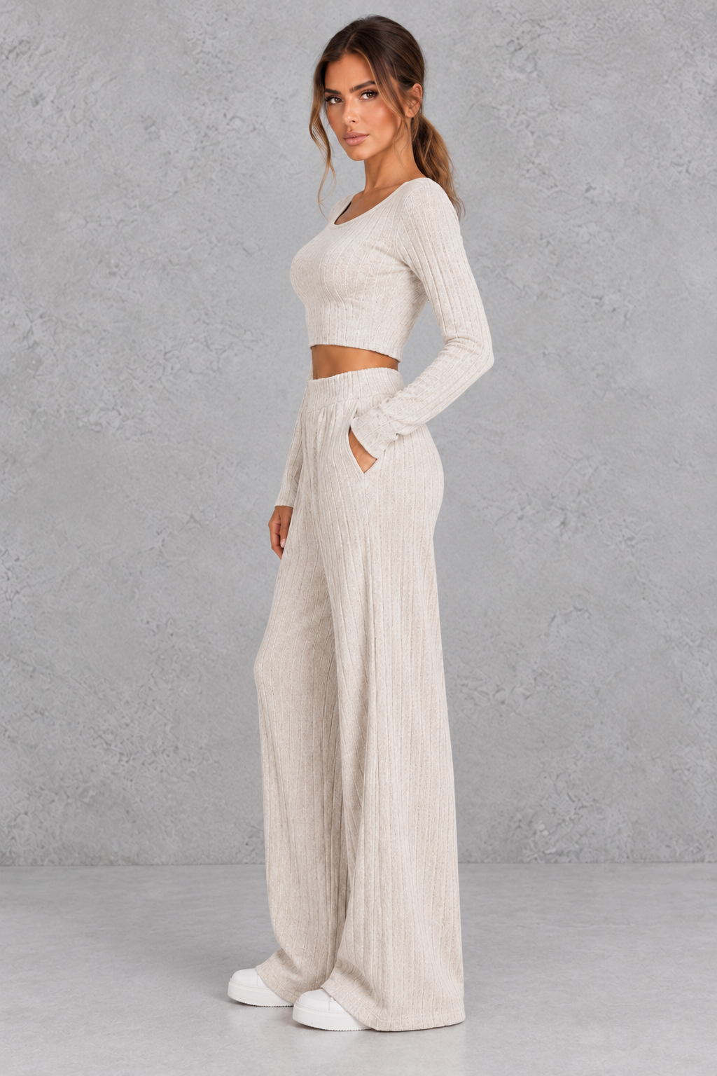 Detail close-up of the scoop neckline and vertical rib texture