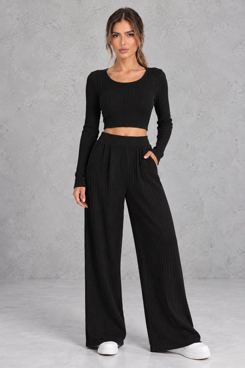 Ribbed knit crop top and pants set shown in apricot and black
