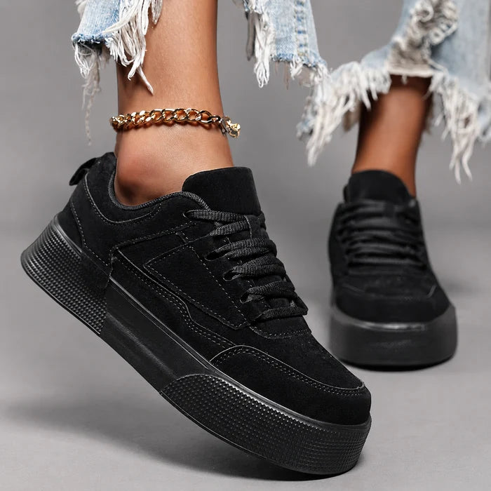 Women’s round toe lace-up sneakers with a lightweight low-top design, cushioned insole, breathable construction, and flexible durable outsole.