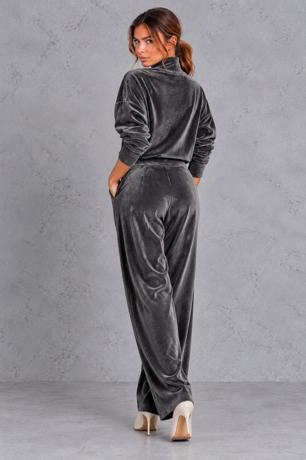 Front pleat and side pocket detail on the velvet pants