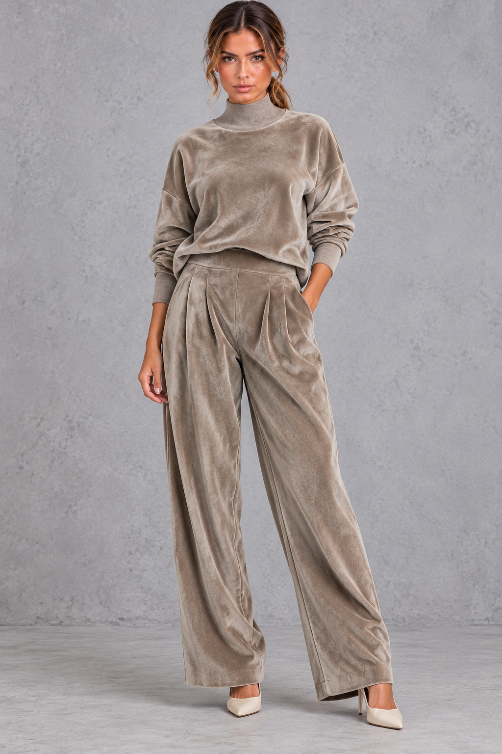 Banded cuff and dropped shoulder detail on the velvet top