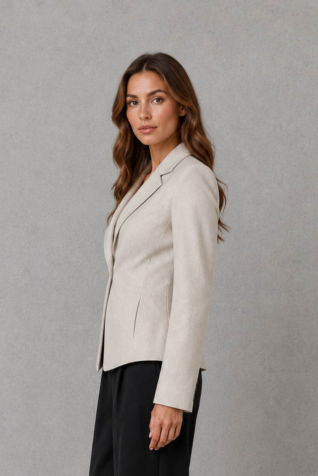 Women’s beige single-button blazer with classic notched lapels, long sleeves, subtle waist shaping, and a structured tailored silhouette.