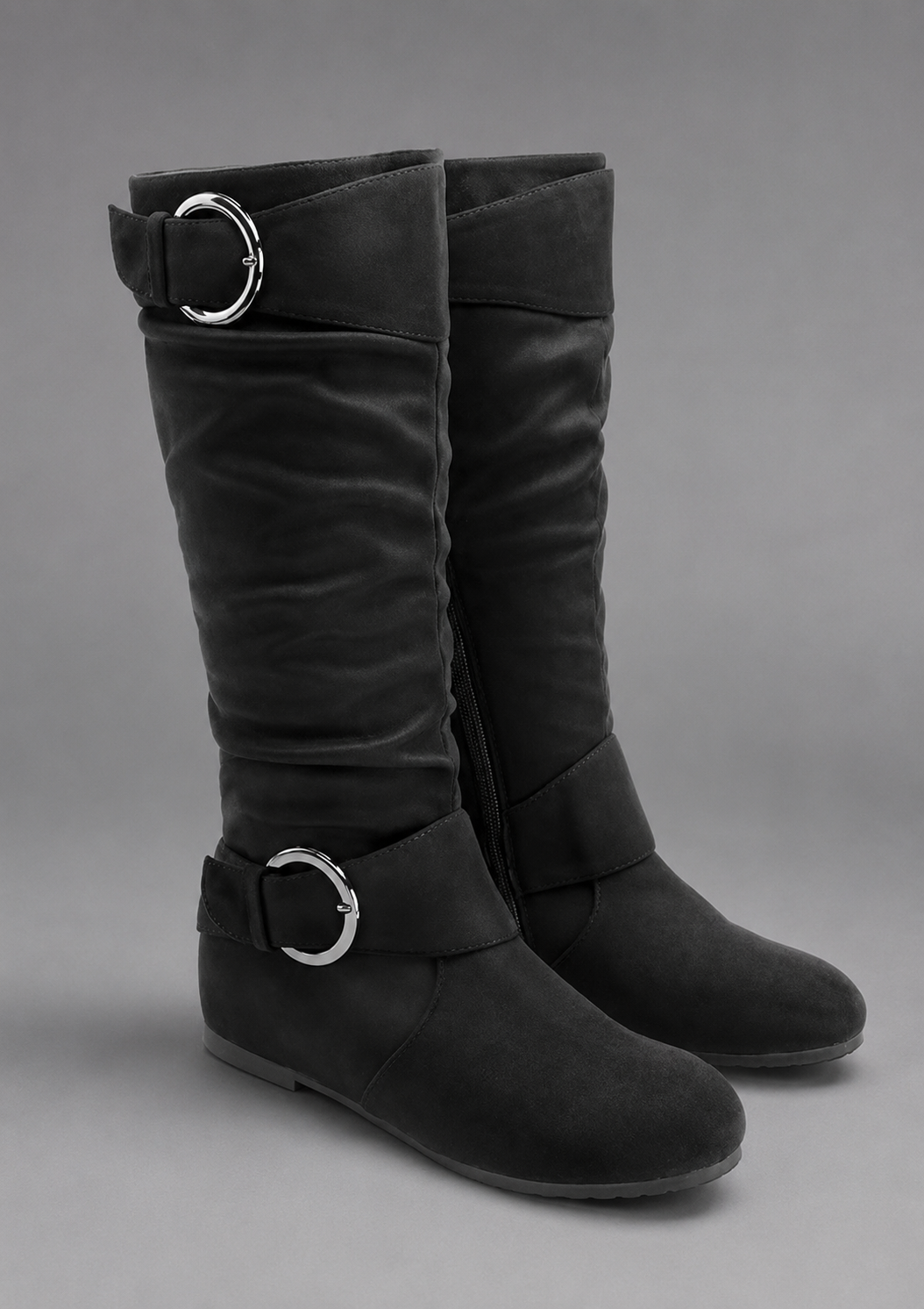 Women’s black slouch mid-calf boots with decorative buckle accents, relaxed shaft, slip-on design, soft textile lining, and durable rubber outsole.