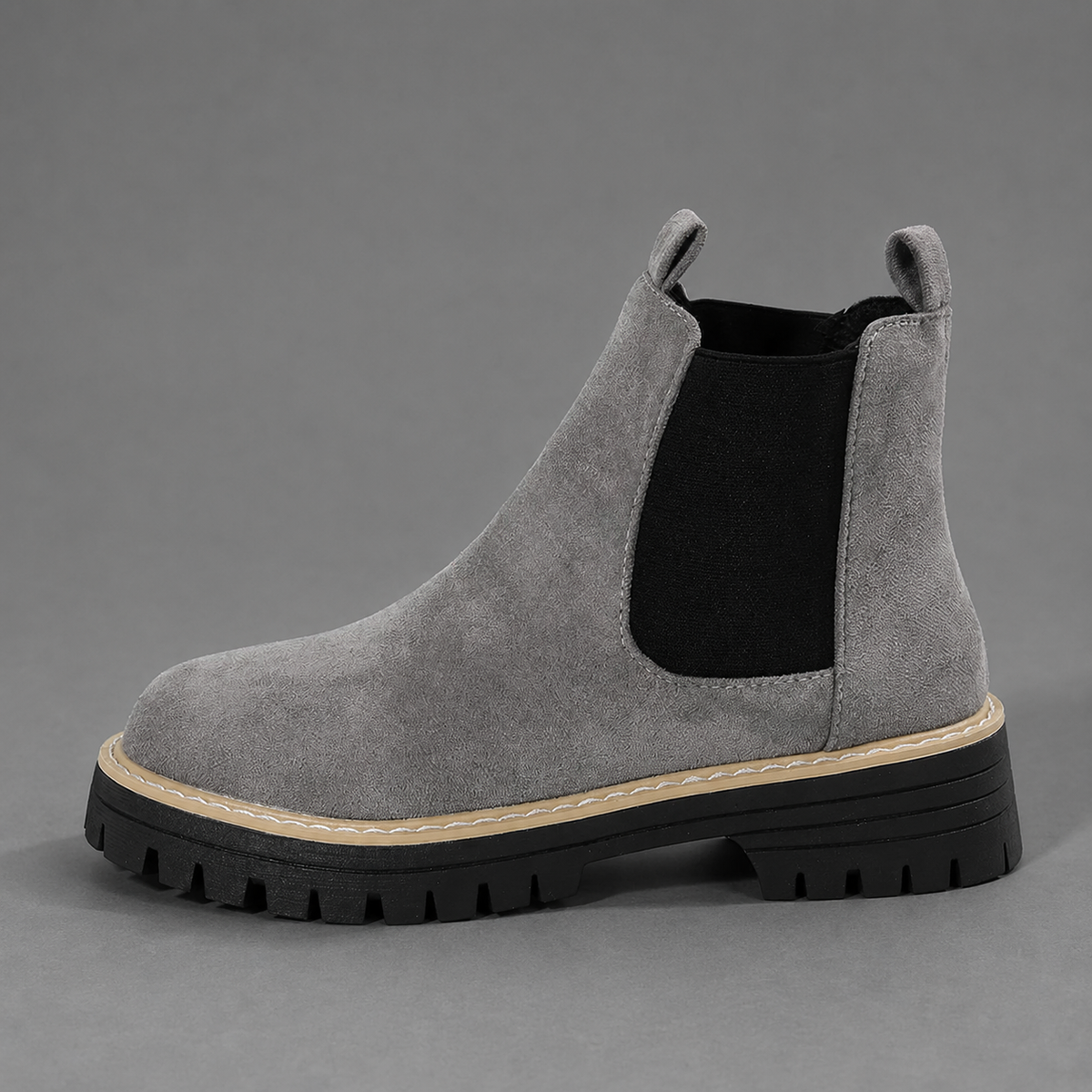 Women’s block heel Chelsea boots with a smooth synthetic leather upper, classic round toe, ankle-high silhouette, and durable rubber outsole.