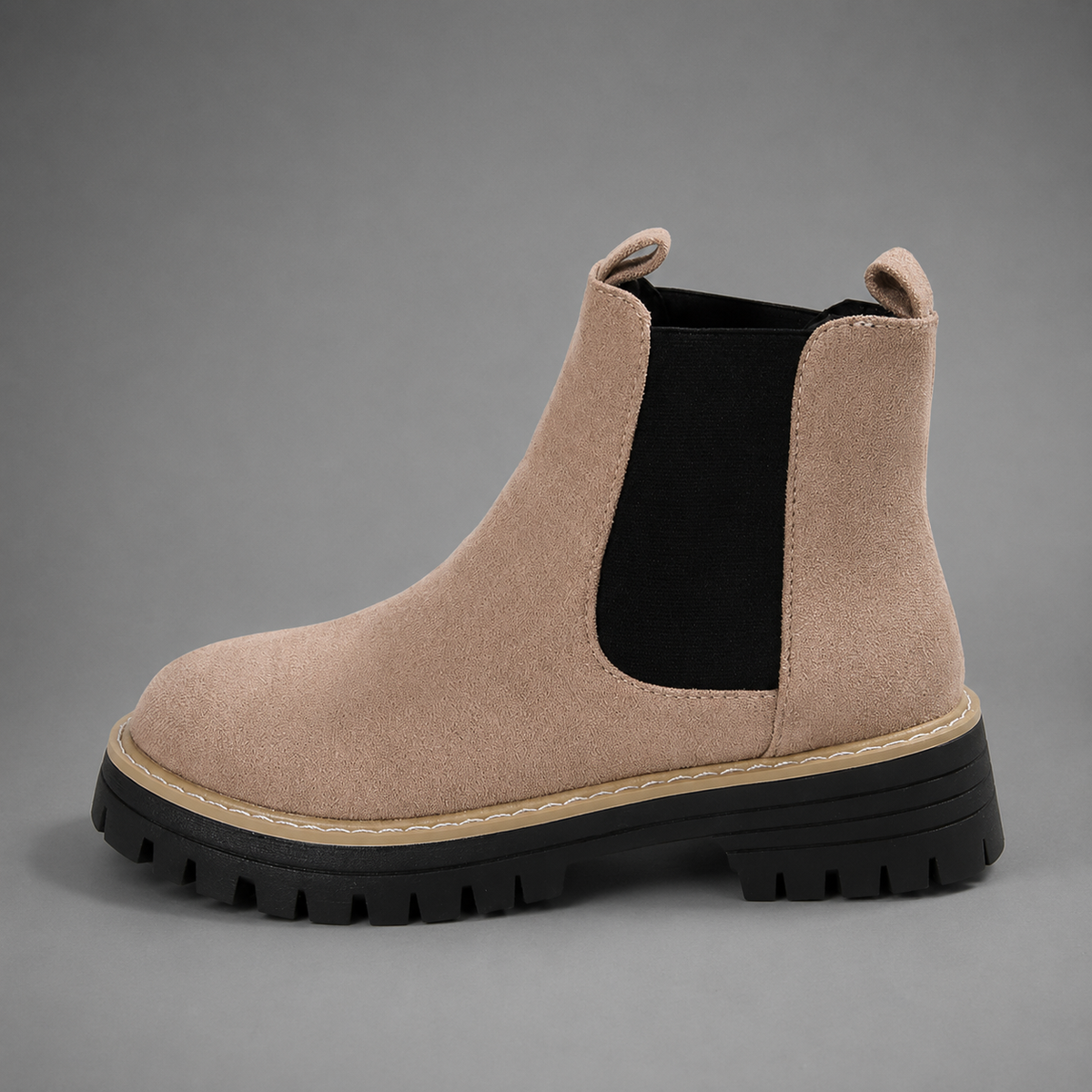 Women’s block heel Chelsea boots with a smooth synthetic leather upper, classic round toe, ankle-high silhouette, and durable rubber outsole.