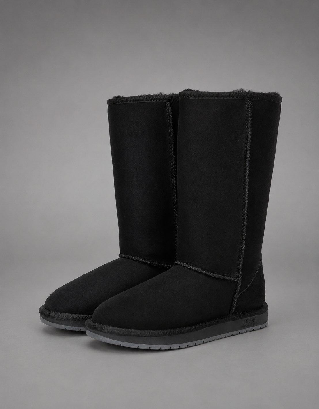 Women’s bow detail mid-calf snow boots with a soft faux fur upper, warm fleece lining, round toe, slip-on design, and flexible rubber sole.