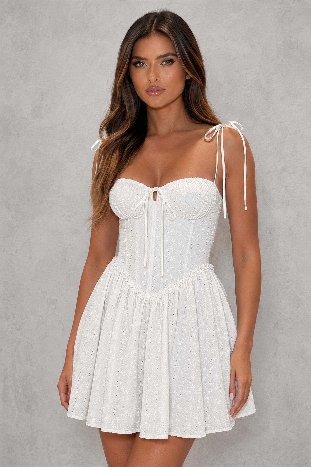 Women's broderie anglaise corset mini dress featuring a structured boned bodice, underwired gathered cups, adjustable shoulder ties, lace-up back, and a full flared skirt, crafted from breathable cotton for summer parties, brunches, and special occasions.