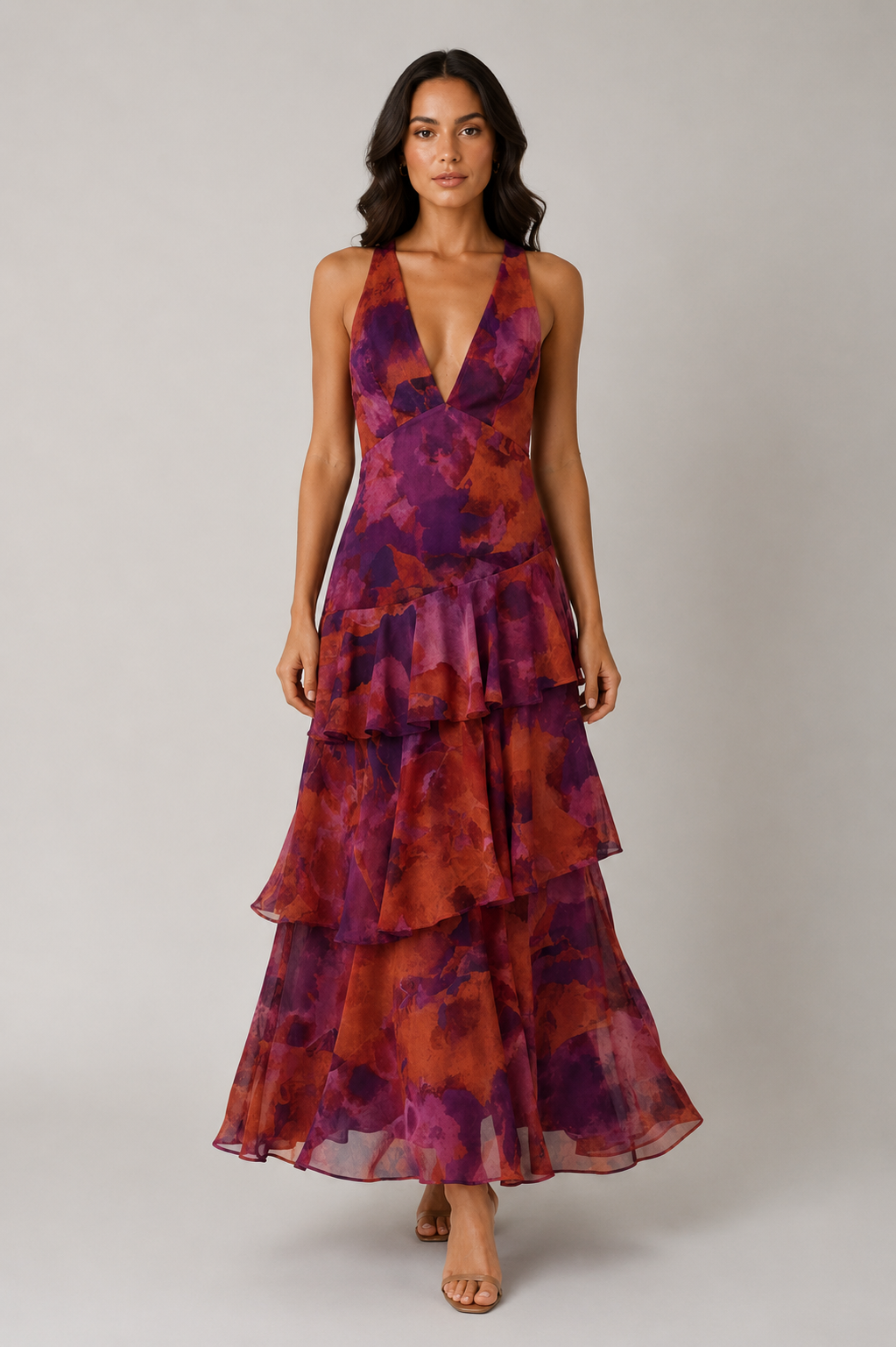 Women's chiffon maxi dress with a V-neckline, tiered ruffle skirt, and flowing silhouette. Lightweight and breathable fabric creates elegant movement, making it suitable for warm-weather events, dinners, and casual outings.