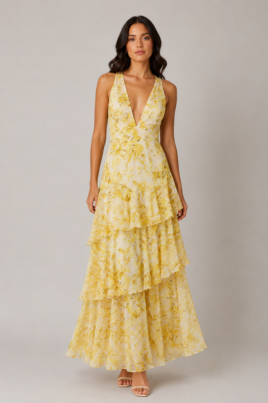 Women's chiffon maxi dress with a V-neckline, tiered ruffle skirt, and flowing silhouette. Lightweight and breathable fabric creates elegant movement, making it suitable for warm-weather events, dinners, and casual outings.