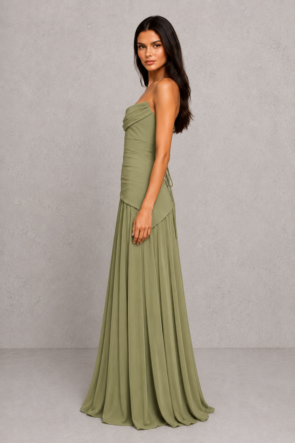 Women's chiffon maxi dress with a pleated cowl neckline, structured boned bodice, asymmetric waist detailing, lace-up back, and flowing multi-godet skirt for elegant evening and formal occasions.