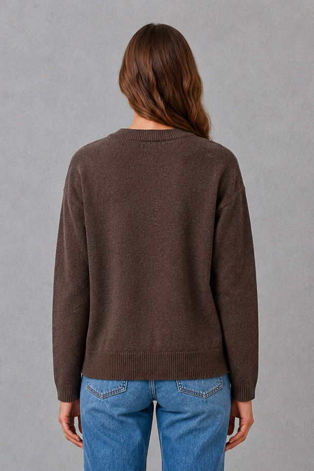 Women’s chunky knit cardigan with a thick textured finish, classic round neckline, long sleeves, and a relaxed loose-fit silhouette.