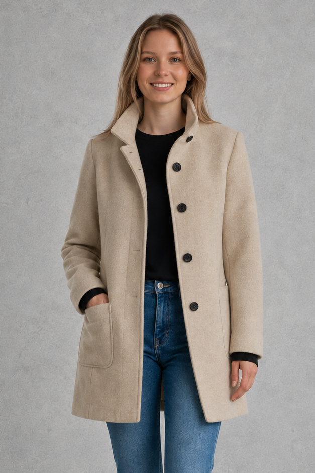 Women’s classic button-front longline coat with a tailored straight silhouette, regular fit and functional side pockets.