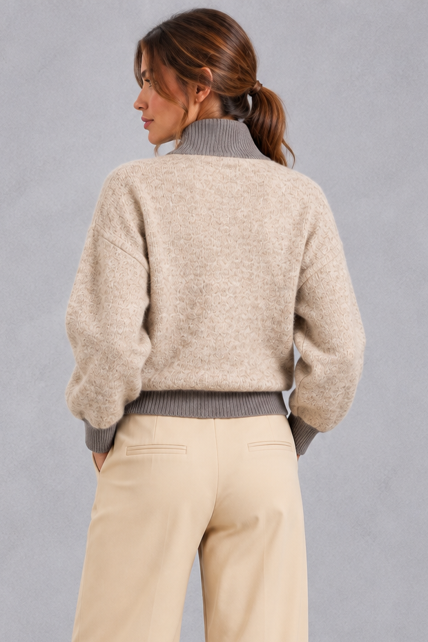Detail of textured knit and contrast ribbed cuff