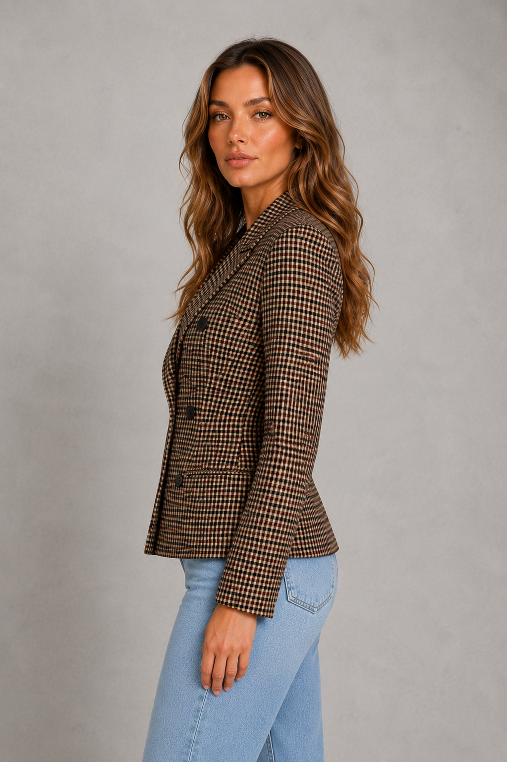 Women’s double-breasted plaid blazer with notched lapels, tailored structured fit, decorative buttons, and front flap pockets.