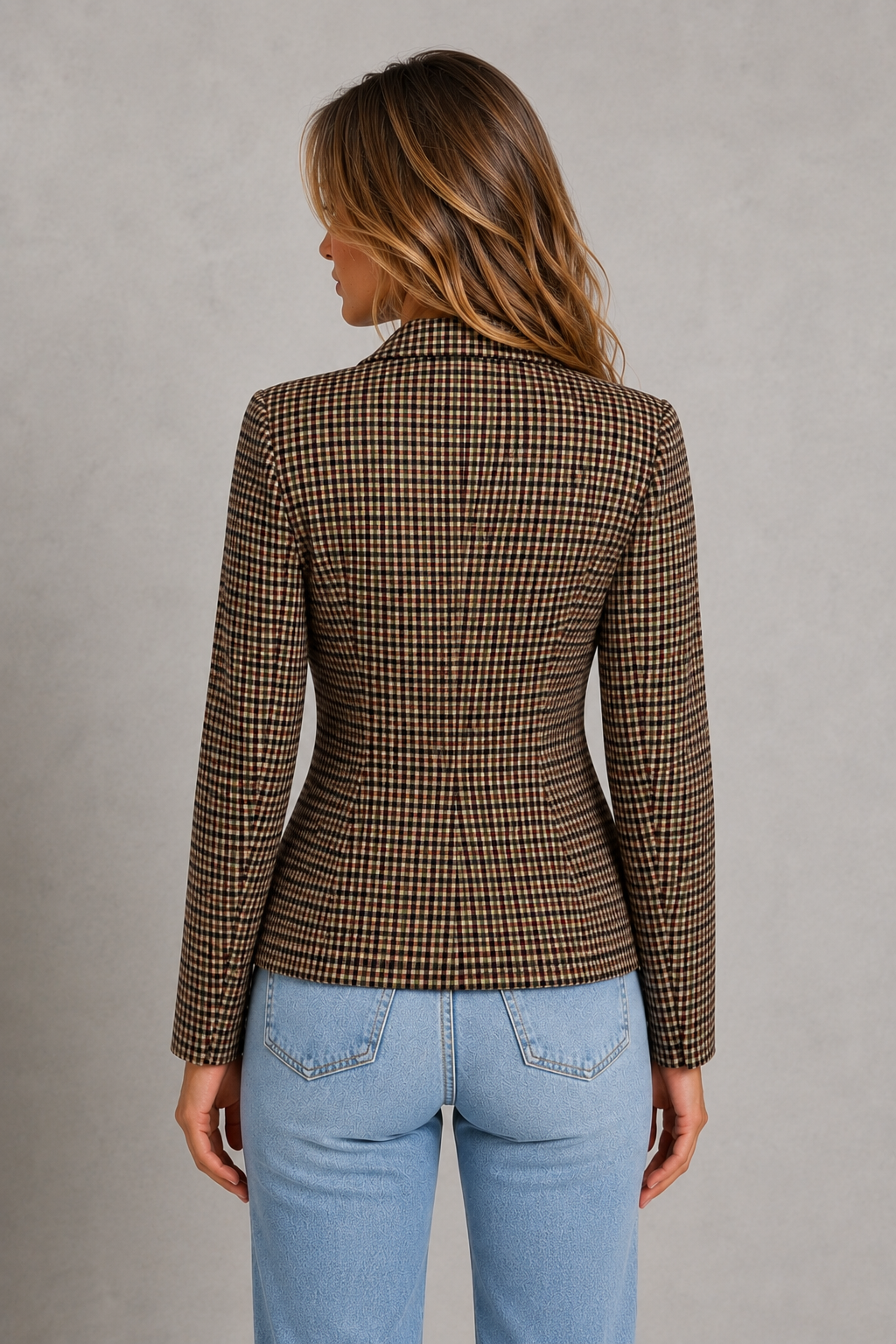 Women’s double-breasted plaid blazer with notched lapels, tailored structured fit, decorative buttons, and front flap pockets.