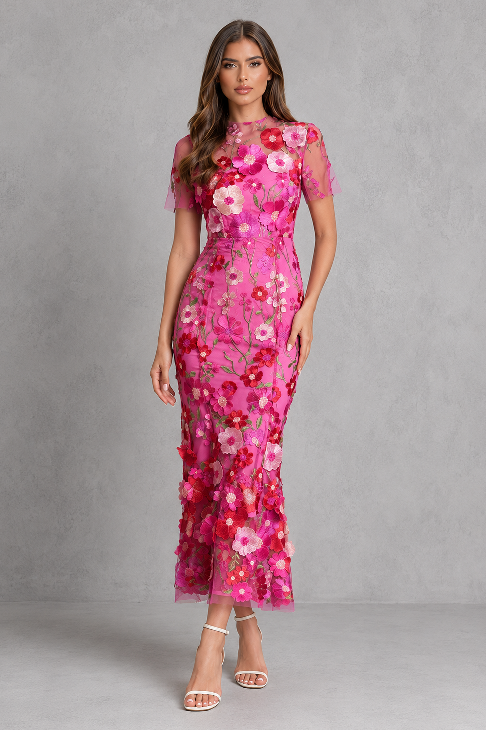Women’s floral appliqué midi dress with elegant high neckline, sheer long sleeves, fitted silhouette and flared hem for wedding and occasion wear.