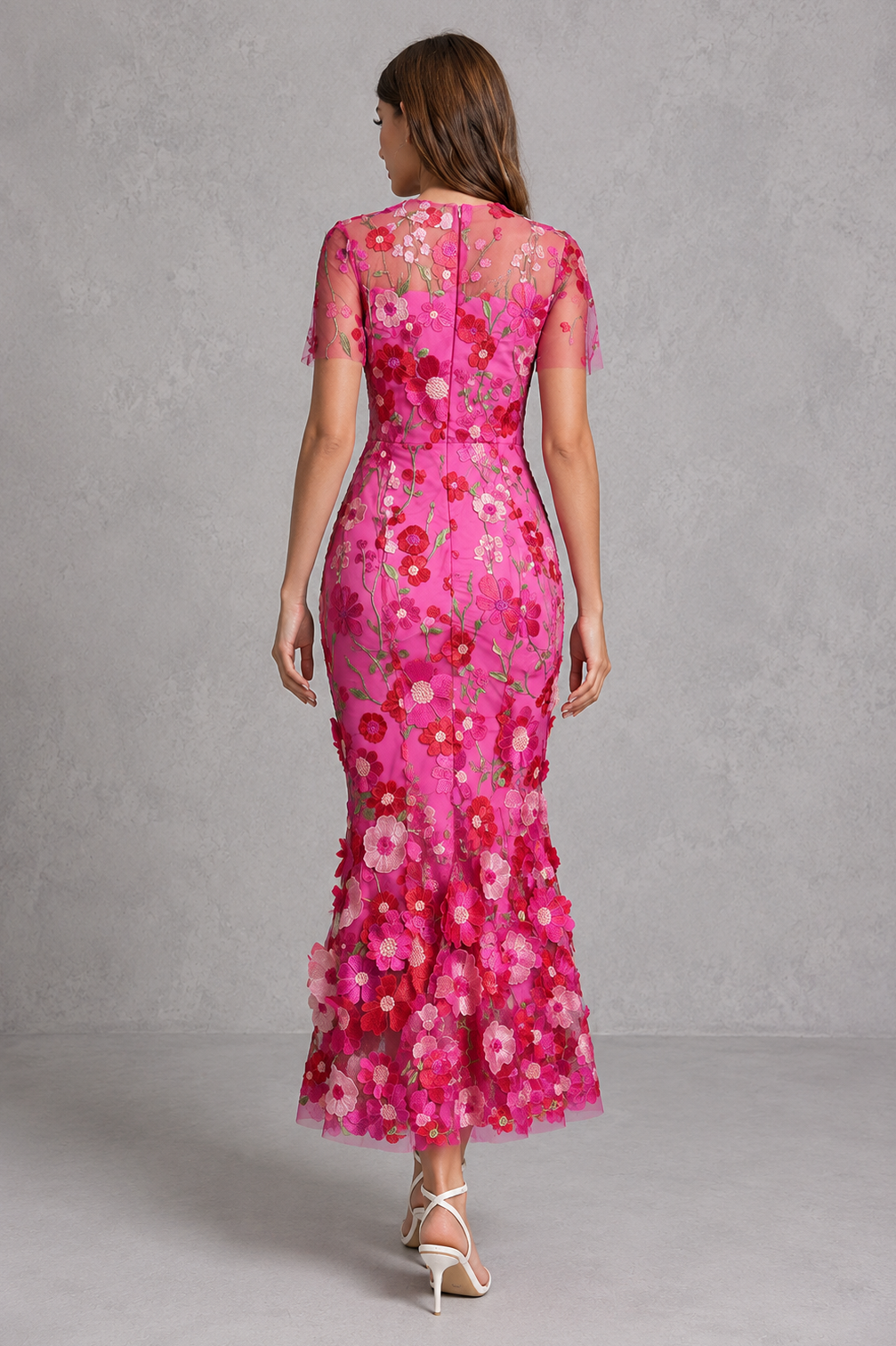 Women’s floral appliqué midi dress with elegant high neckline, sheer long sleeves, fitted silhouette and flared hem for wedding and occasion wear.