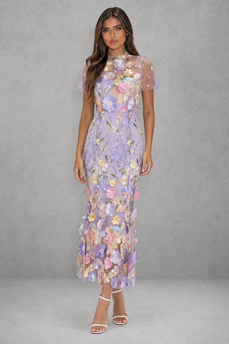 Women’s floral appliqué midi dress with elegant high neckline, sheer long sleeves, fitted silhouette and flared hem for wedding and occasion wear.