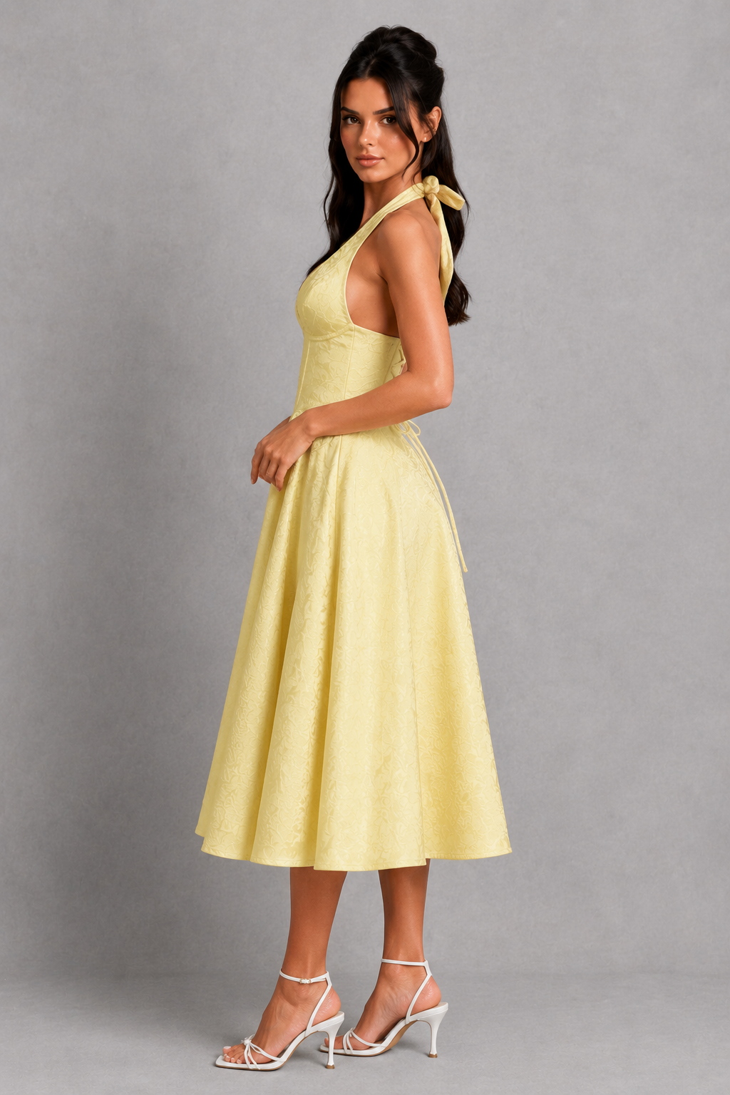 Women's floral jacquard halter midi dress with a structured boned corset bodice, plunge neckline, lace-up back, and full tulle-lined skirt, designed for elegant party wear, weddings, and special occasions.