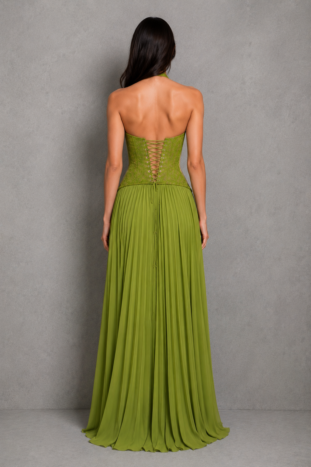 Floral lace corset maxi dress with sweetheart neckline, halter strap, fitted bodice, and flowing pleated skirt for formal occasions.