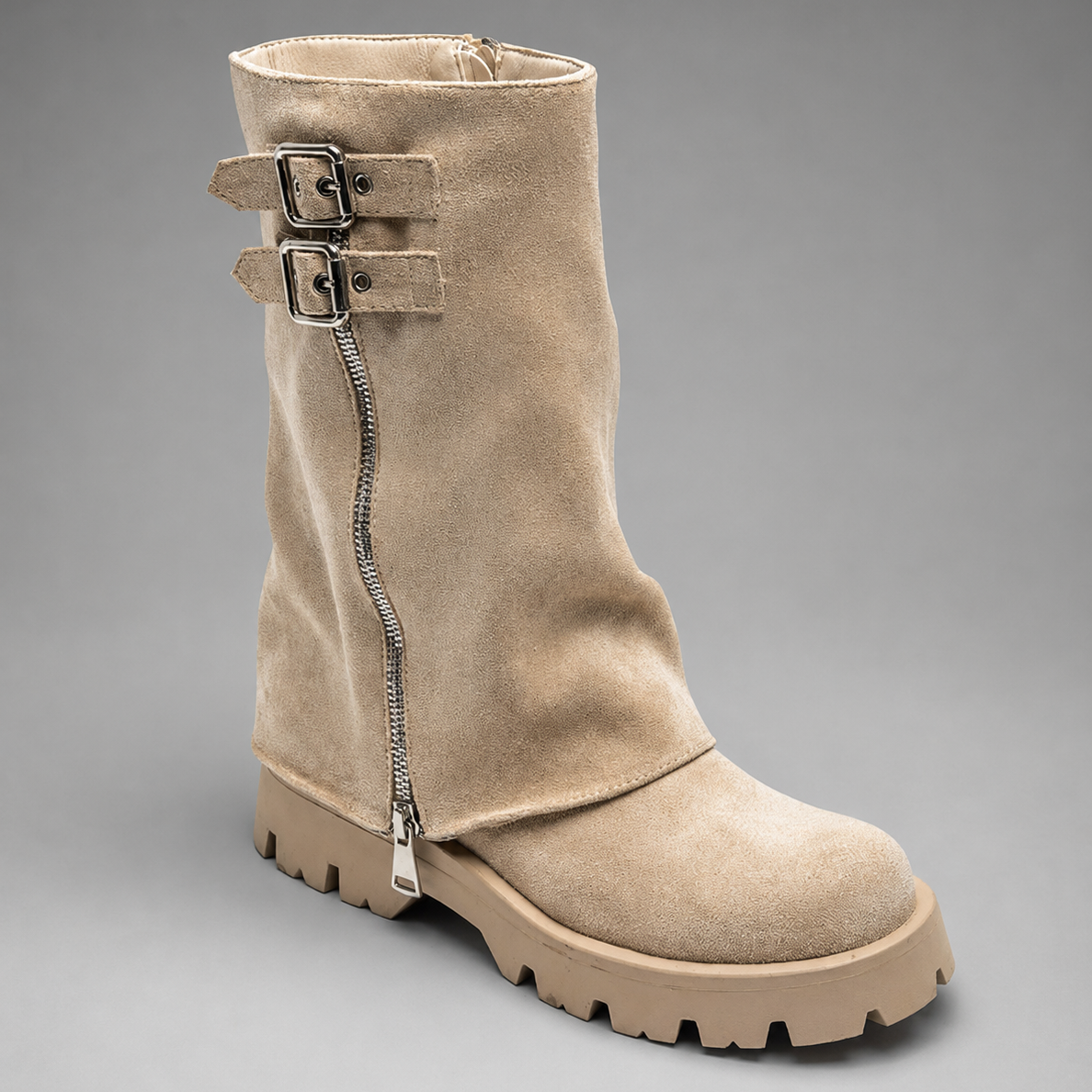 Women’s genuine leather knee-high biker boots with a supple leather upper, long external zipper, double buckle accents, and sturdy sole.