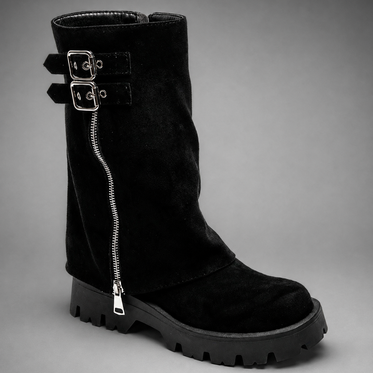Women’s genuine leather knee-high biker boots with a supple leather upper, long external zipper, double buckle accents, and sturdy sole.