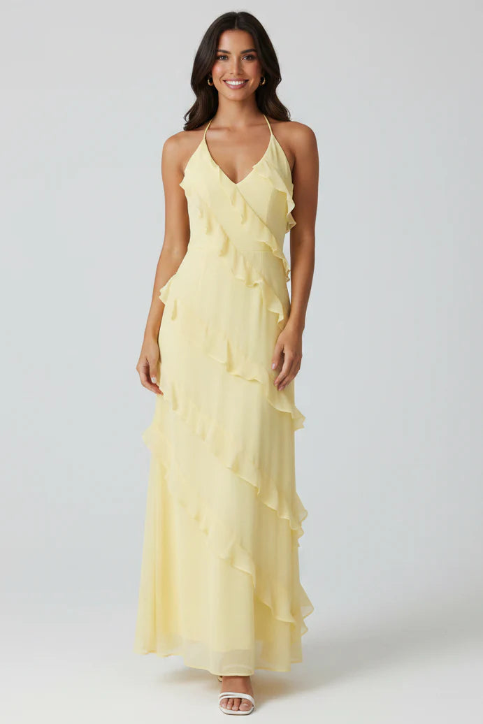Womenโs halter neck ruffle maxi dress with a flowing full-length silhouette, soft ruffle detailing, and a figure-skimming bodice. Lightweight breathable fabric creates elegant movement, making it ideal for evening events, special occasions, and holiday wear.