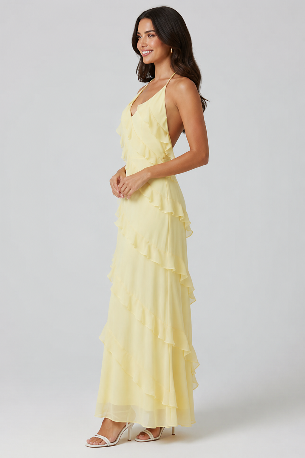 Womenโs halter neck ruffle maxi dress with a flowing full-length silhouette, soft ruffle detailing, and a figure-skimming bodice. Lightweight breathable fabric creates elegant movement, making it ideal for evening events, special occasions, and holiday wear.
