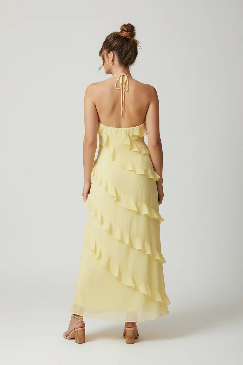 Womenโs halter neck ruffle maxi dress with a flowing full-length silhouette, soft ruffle detailing, and a figure-skimming bodice. Lightweight breathable fabric creates elegant movement, making it ideal for evening events, special occasions, and holiday wear.