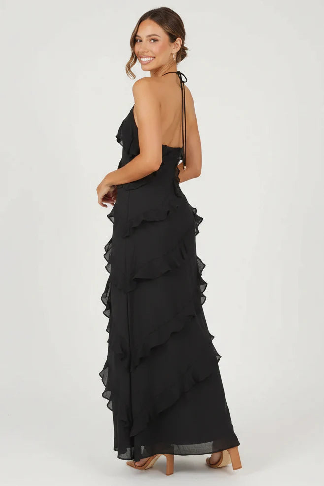 Womenโs halter neck ruffle maxi dress with a flowing full-length silhouette, soft ruffle detailing, and a figure-skimming bodice. Lightweight breathable fabric creates elegant movement, making it ideal for evening events, special occasions, and holiday wear.