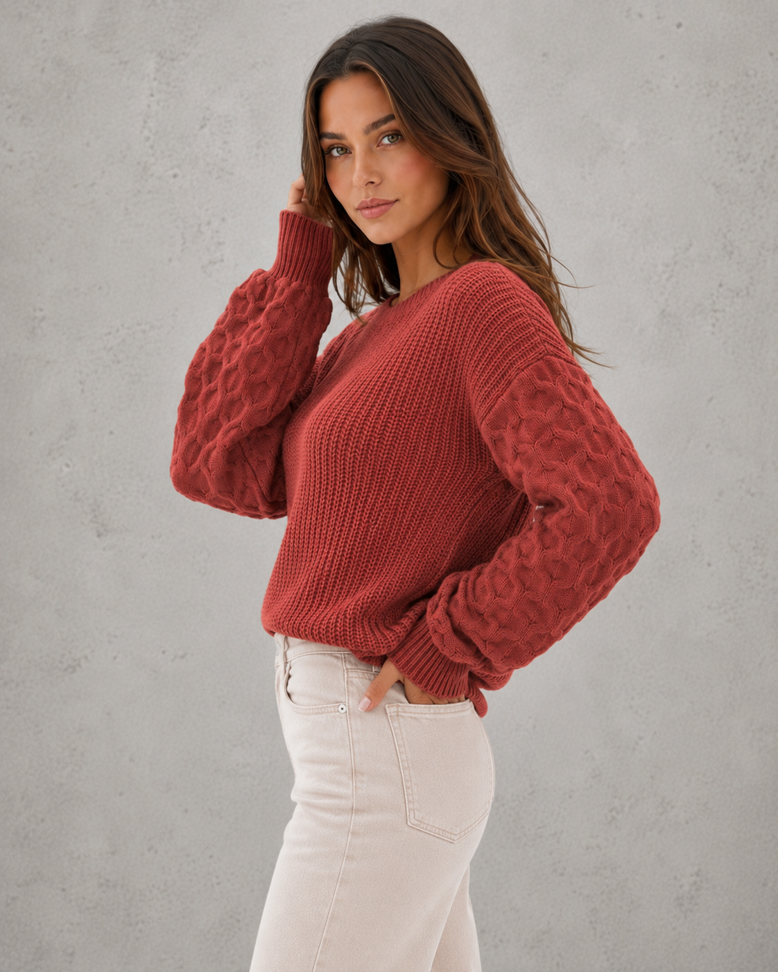 Women's relax fit spring sweater with textured lantern sleeves, soft knit construction, and relaxed silhouette for elegant everyday wear.