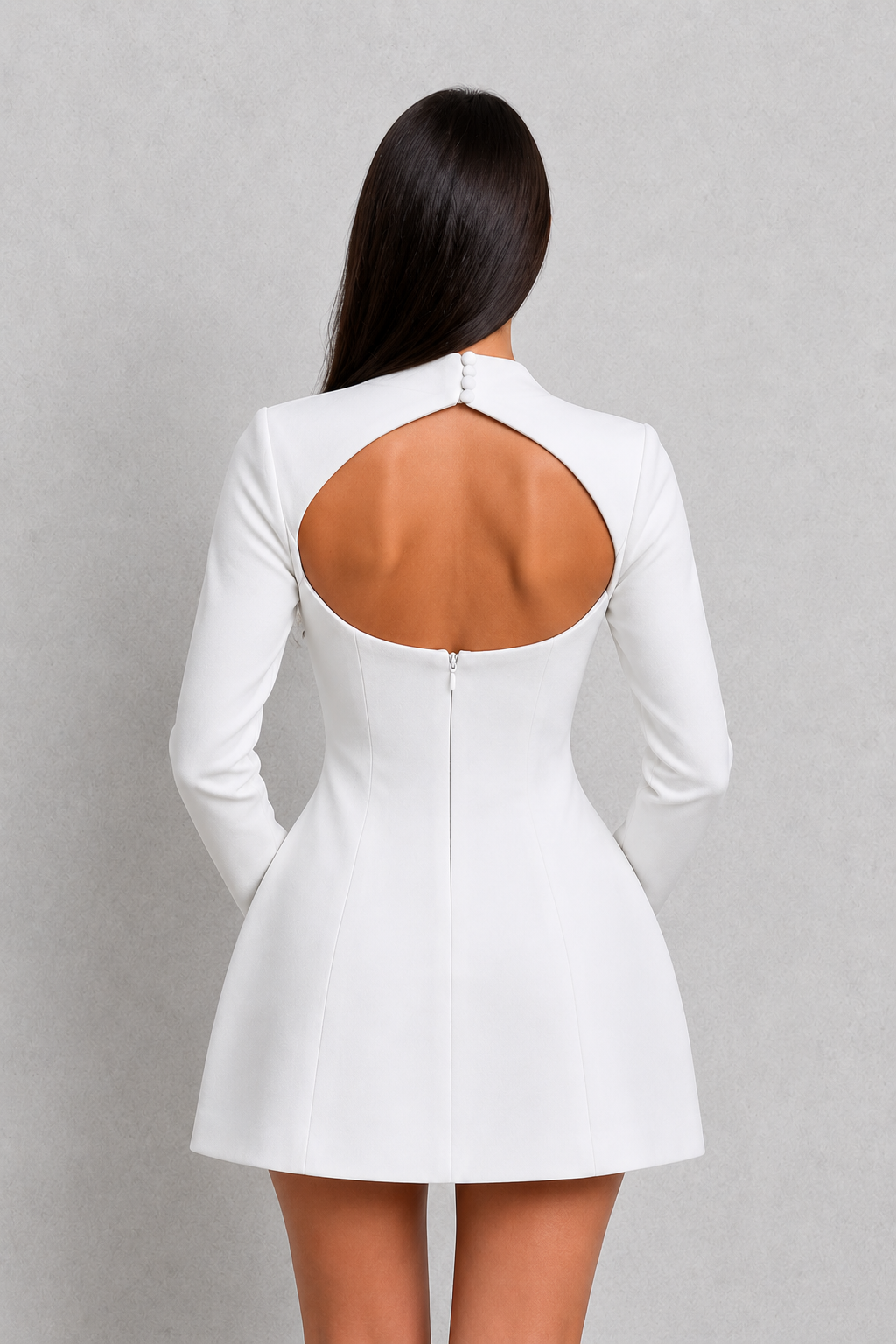 Women's long sleeve mini dress in structured crepe fabric featuring a fitted bodice, high neckline, seam detailing, voluminous bubble skirt, and elegant keyhole back, ideal for parties, celebrations, and special occasions.