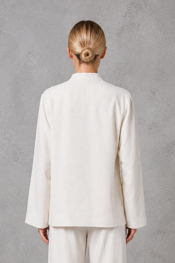 Women’s mandarin collar blazer with a sleek stand collar, streamlined front closure, structured woven fabric, and relaxed tailored silhouette.