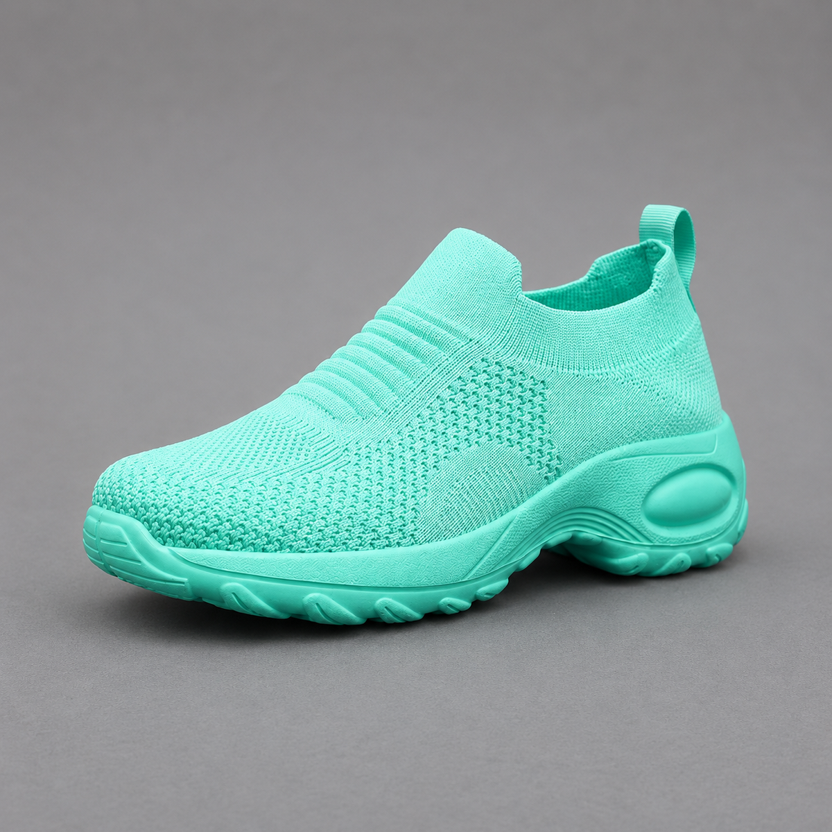 Women’s orthopedic slip-on sneakers with a breathable stretch-knit upper, cushioned footbed and thick lightweight shock-absorbing sole.