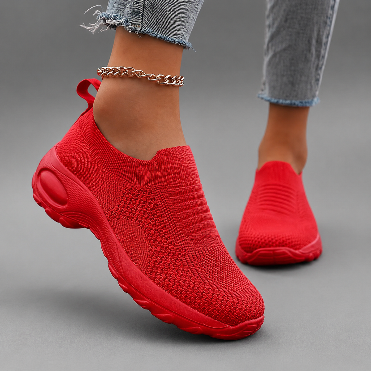 Women’s orthopedic slip-on sneakers with a breathable stretch-knit upper, cushioned footbed and thick lightweight shock-absorbing sole.